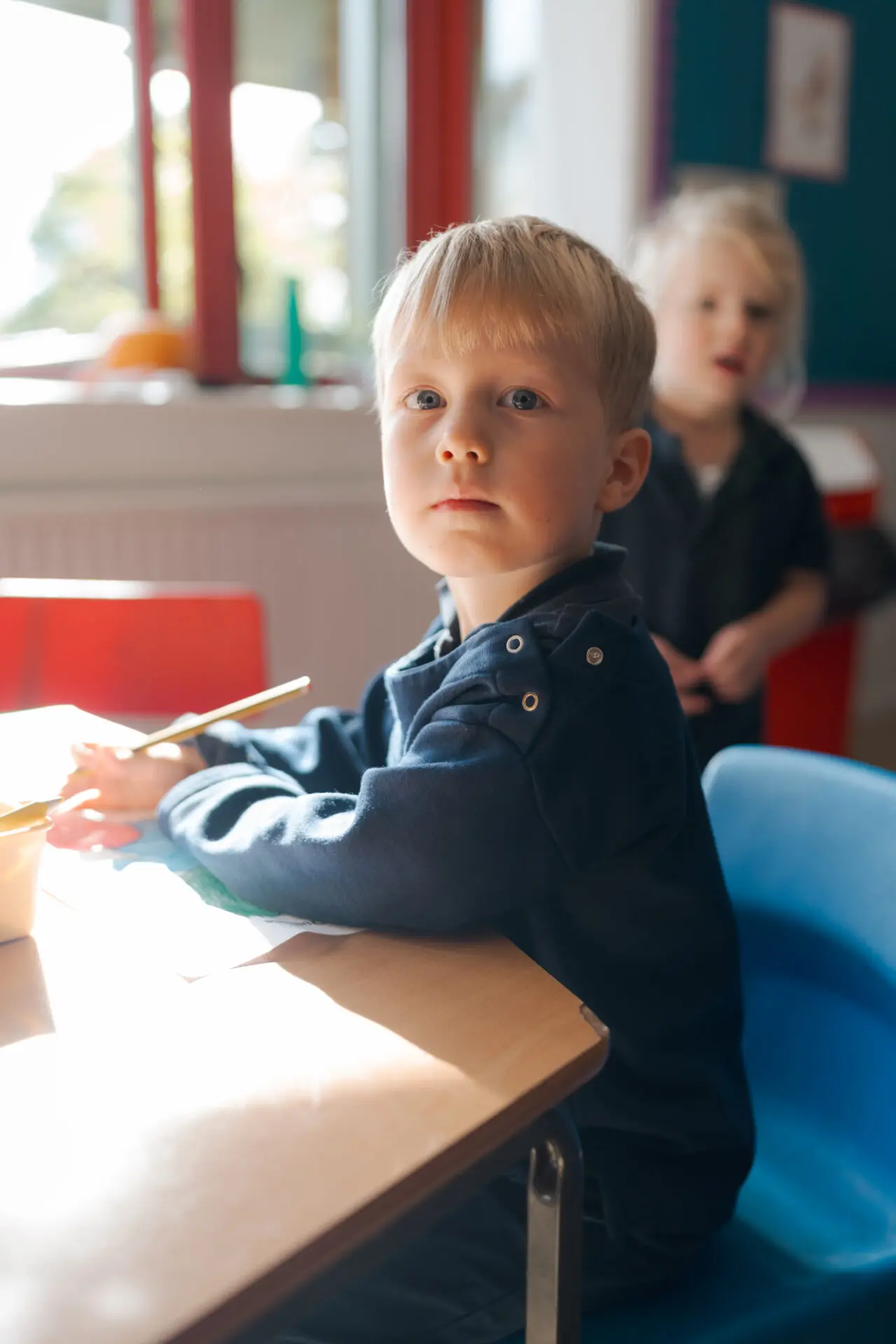 Prep-school boy looking into the camera Image of a prep-school boy looking into the camera
